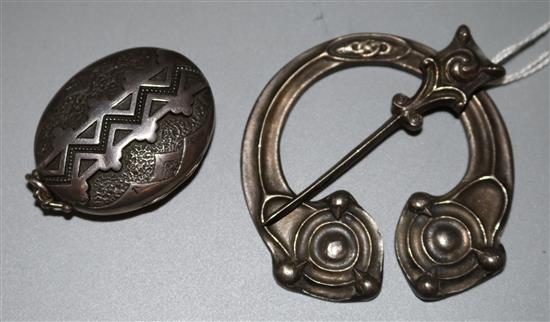 Iona silver brooch and a silver locket